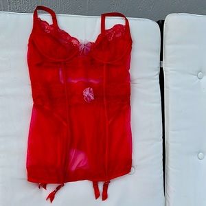Worn once red Victoria’s Secret lace slip with garter straps and pink bow